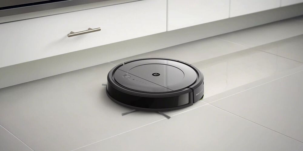 A Roomba mopping a floor